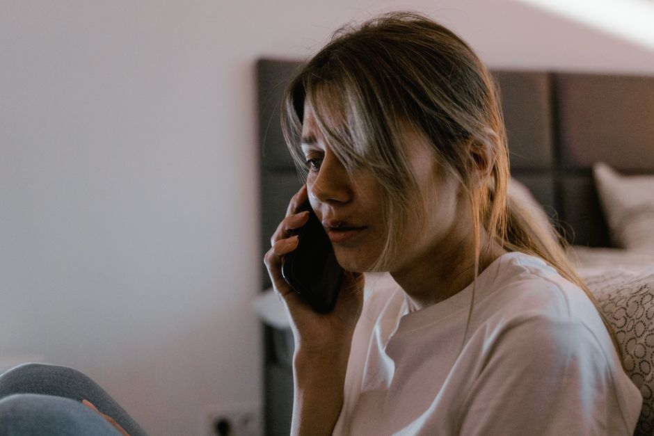 Person isolated with only a phone AI companion for interaction