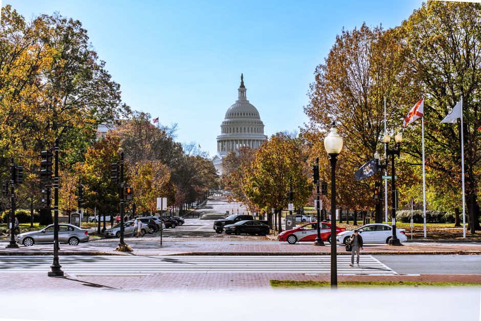 Government officials discussing autonomous vehicle policy