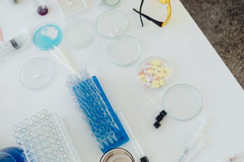 Biotechnology researcher using AI tools for drug discovery