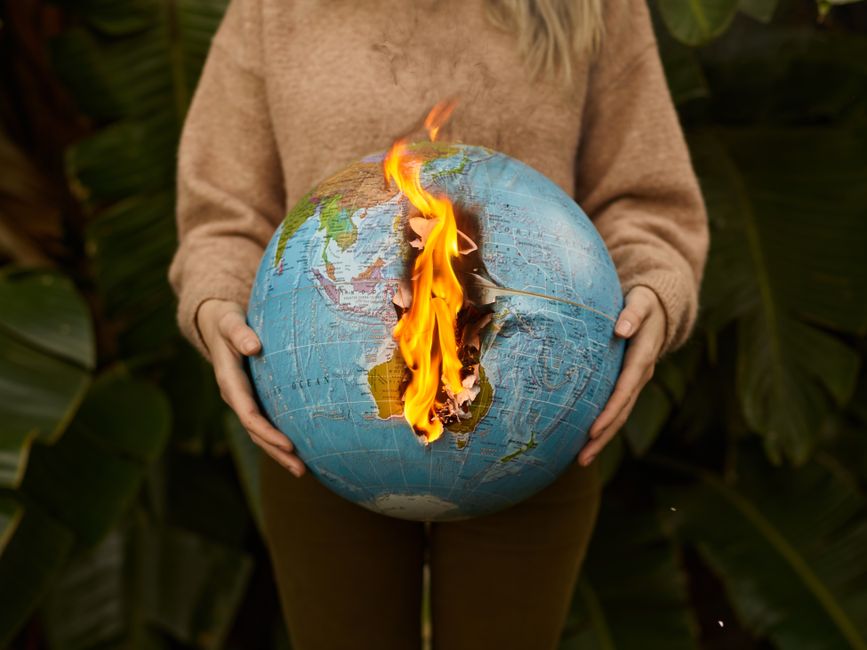 Climate change visualization showing rising global temperature data and heat wave patterns