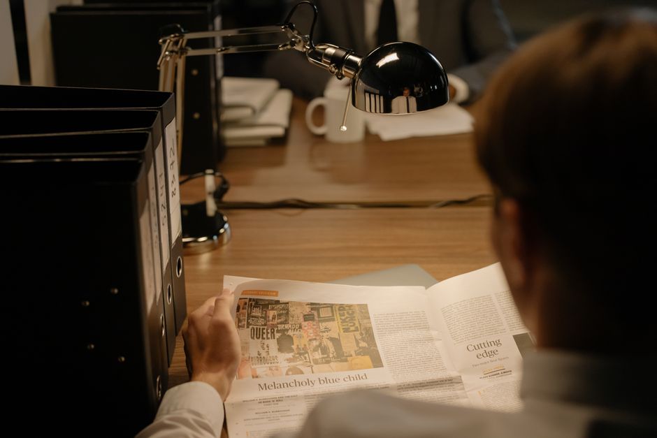 Person analyzing an extremely long document with AI assistance on screen