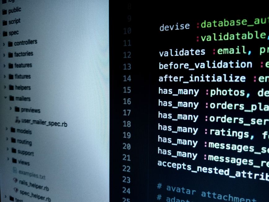 Developer writing code on a computer screen