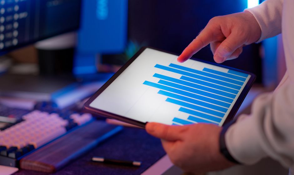Data analyst reviewing performance scoring metrics on a screen