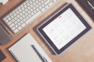 Digital planner on tablet with calendar and schedule