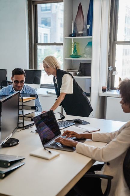 Business team using AI tools in a modern enterprise office environment