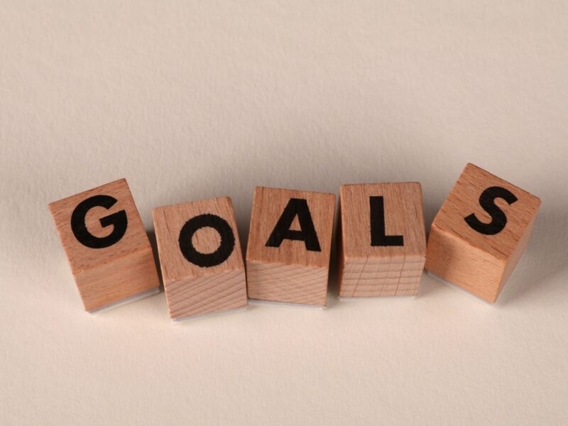 Person setting goals and planning for success
