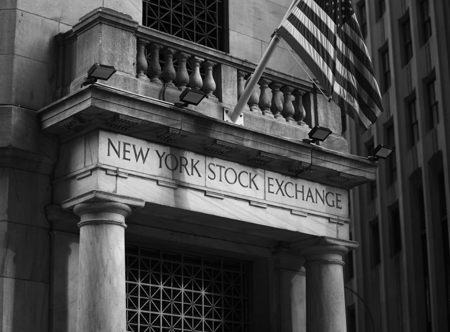 Stock exchange building with IPO listing banners outside
