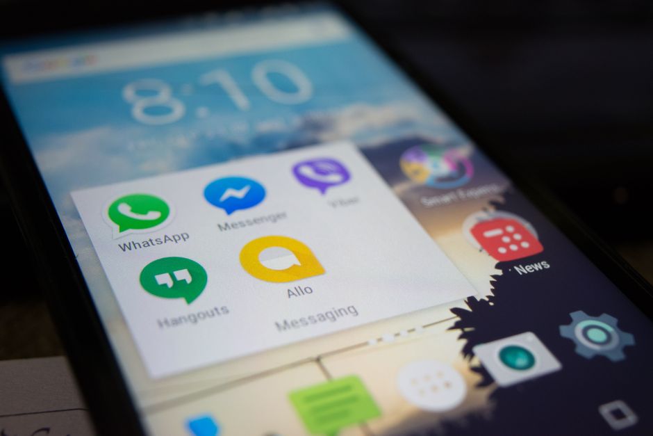 Multiple messaging app icons displayed on a smartphone screen