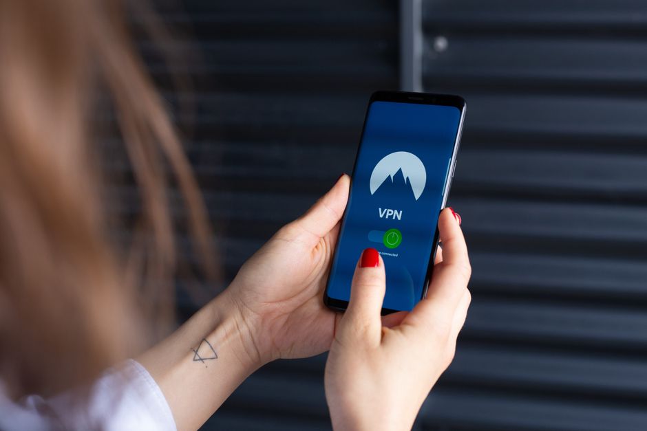 Person looking concerned at privacy settings on a smartphone