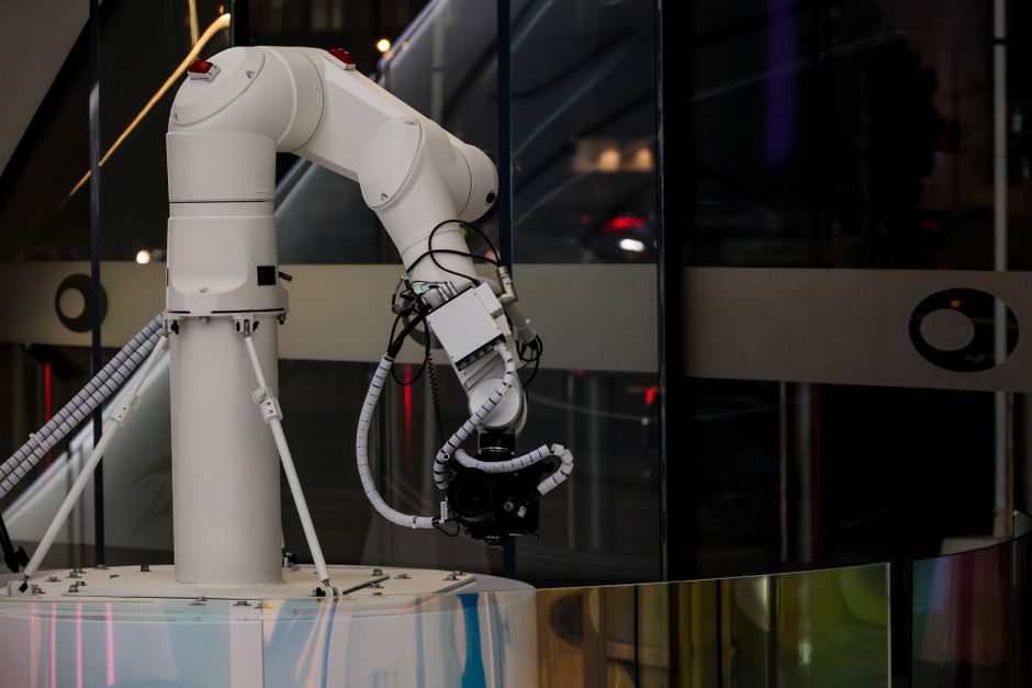 Industrial robot arm in a modern automated factory