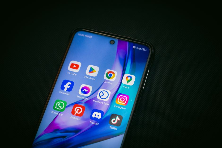 Social media app icons on a smartphone screen