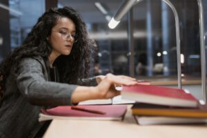 student-studying-books-university