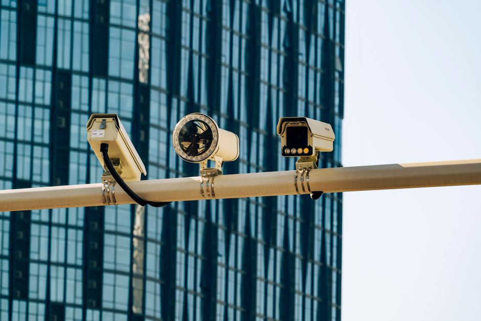 Smart city with digital surveillance cameras and screens