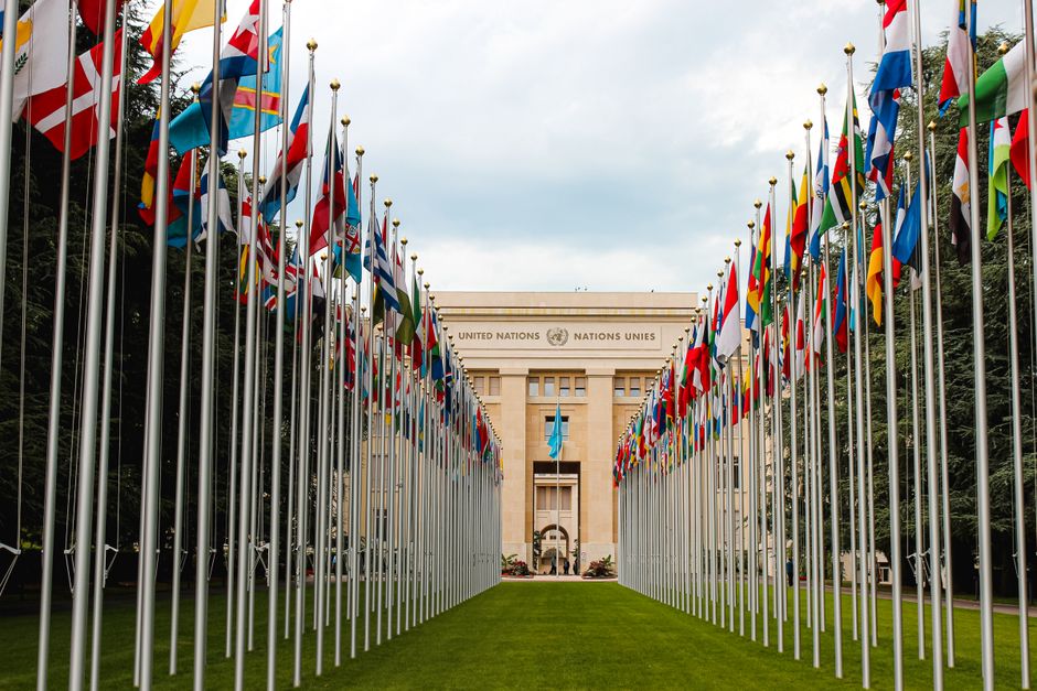 International diplomatic meeting at a conference table