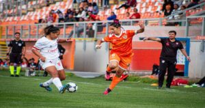women-football-soccer-stadium-crowd