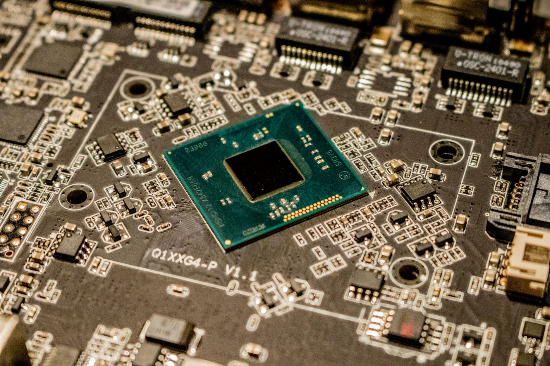 Close-up of a silicon processor chip on a circuit board