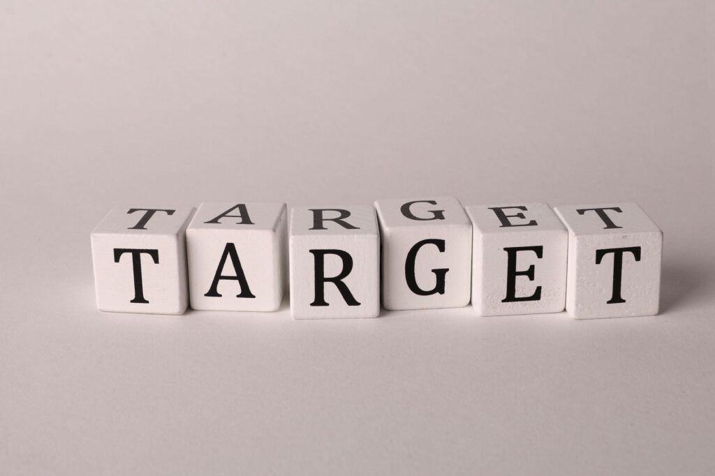 White cubes spelling 'TARGET' on a neutral background, ideal for business or marketing concepts.