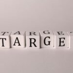 White cubes spelling 'TARGET' on a neutral background, ideal for business or marketing concepts.