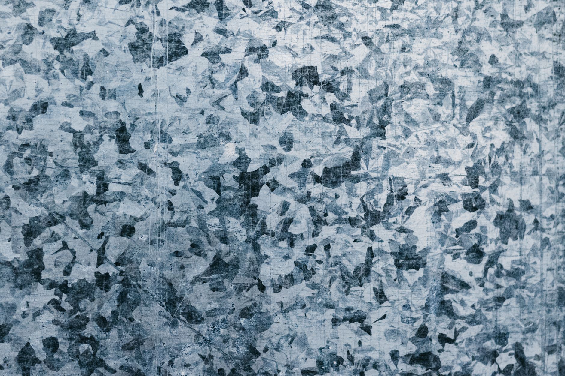 Brushed titanium surface representing the phone frame material