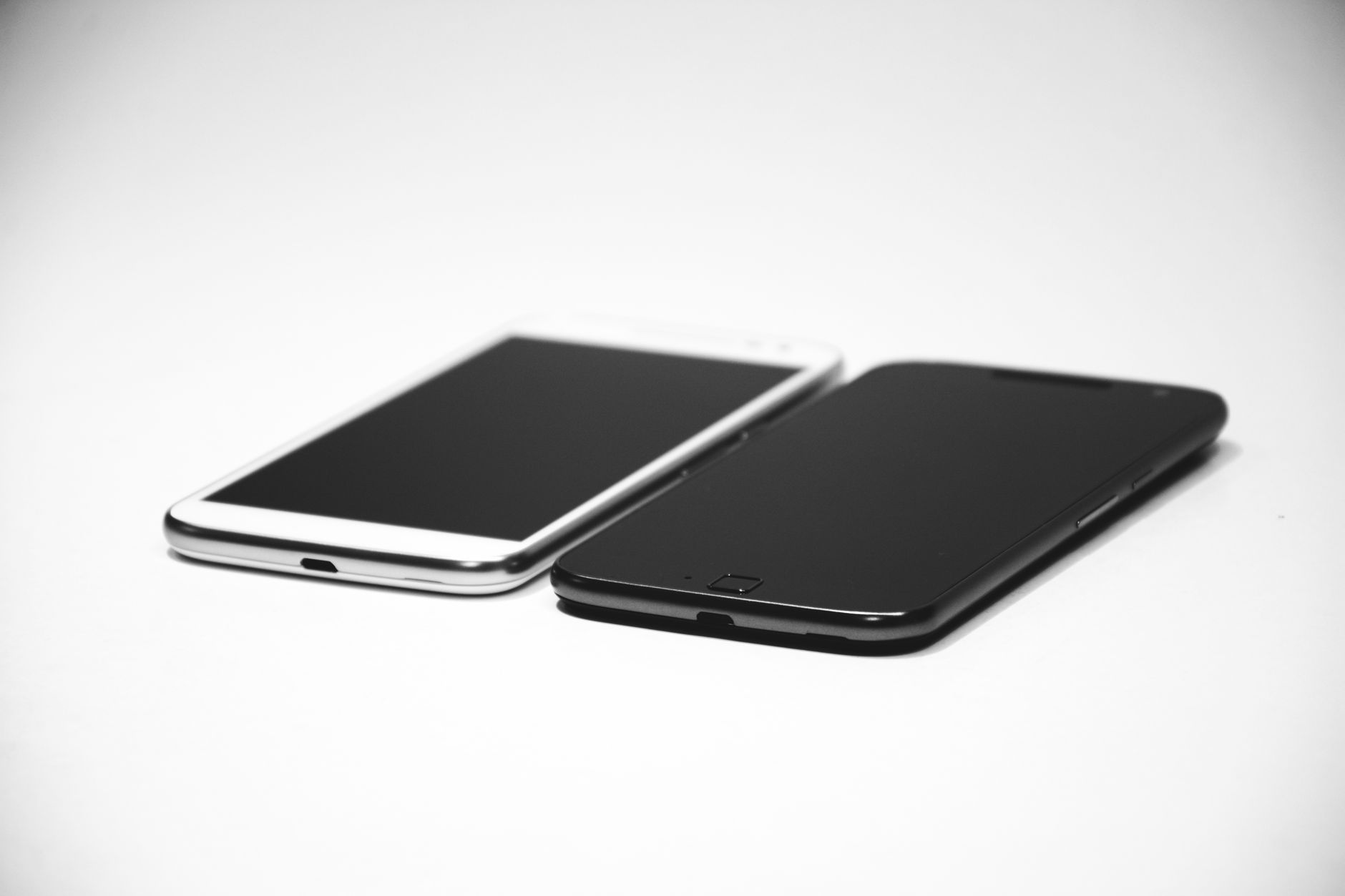 Two smartphones placed side by side for comparison